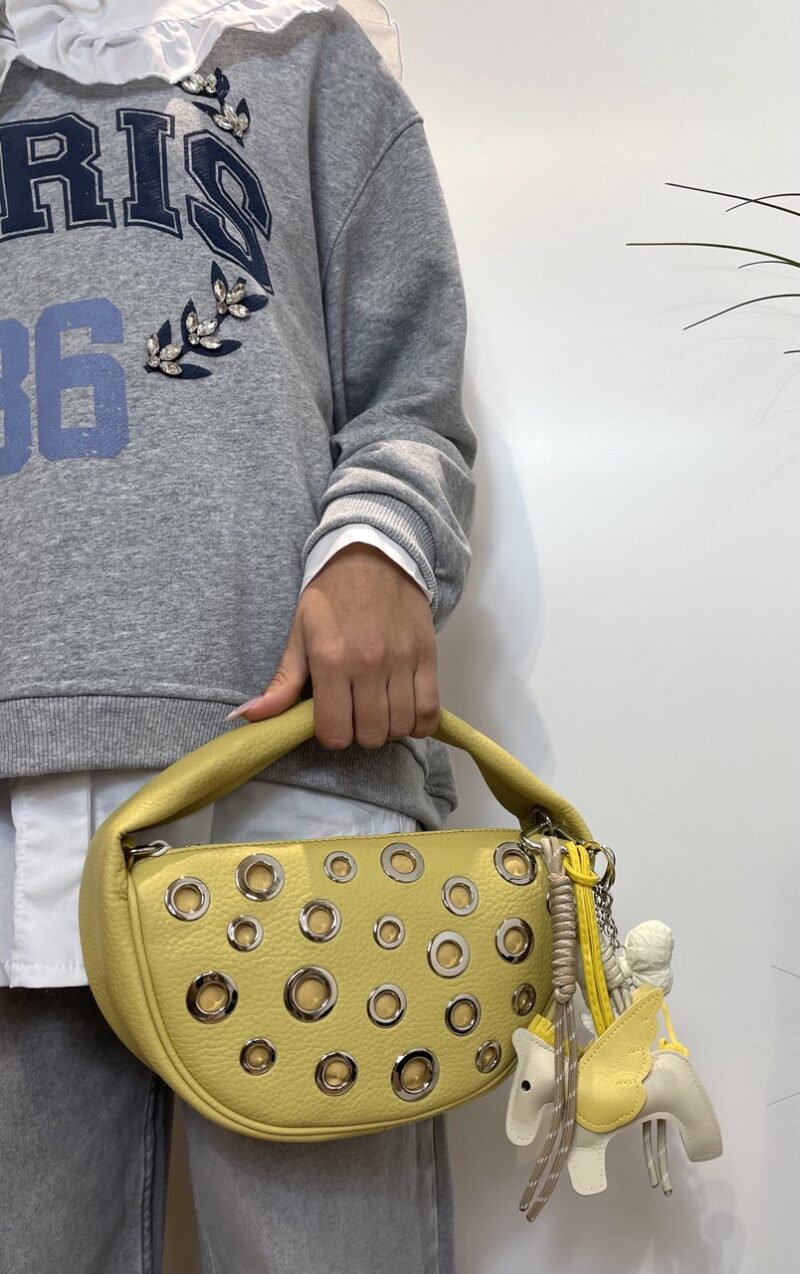 Borsa mezzaluna gialla con occhielli